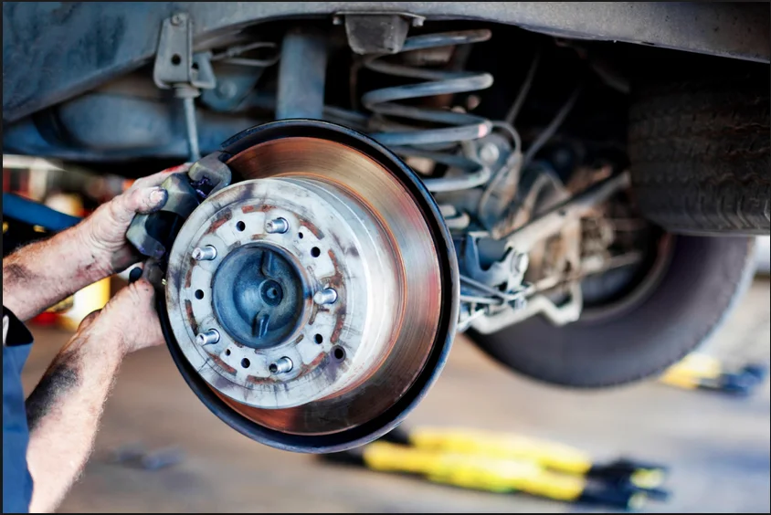 Brake and suspension components at a wheel